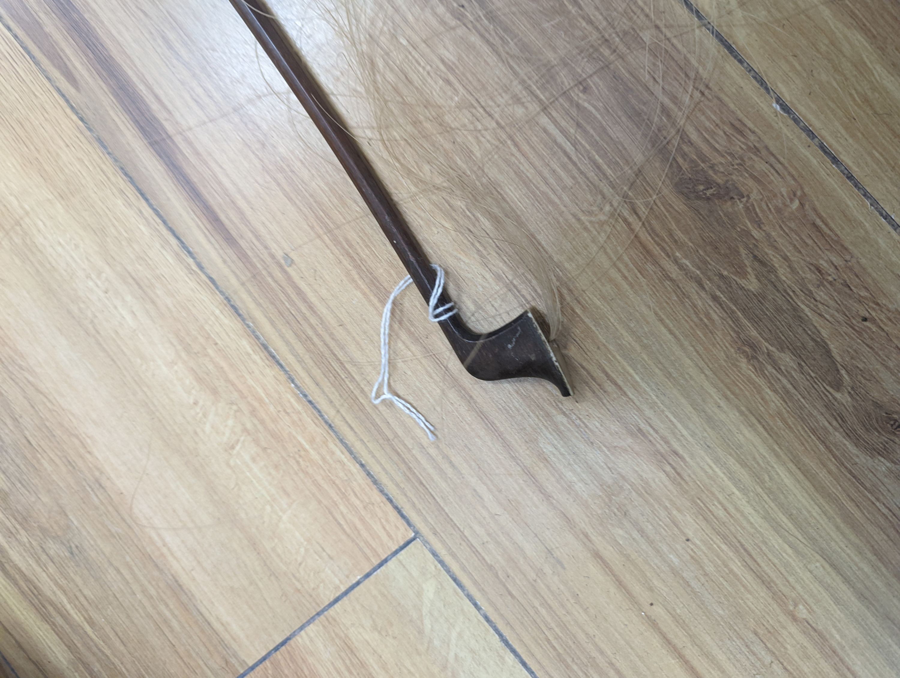 A violin and bow, various records etc